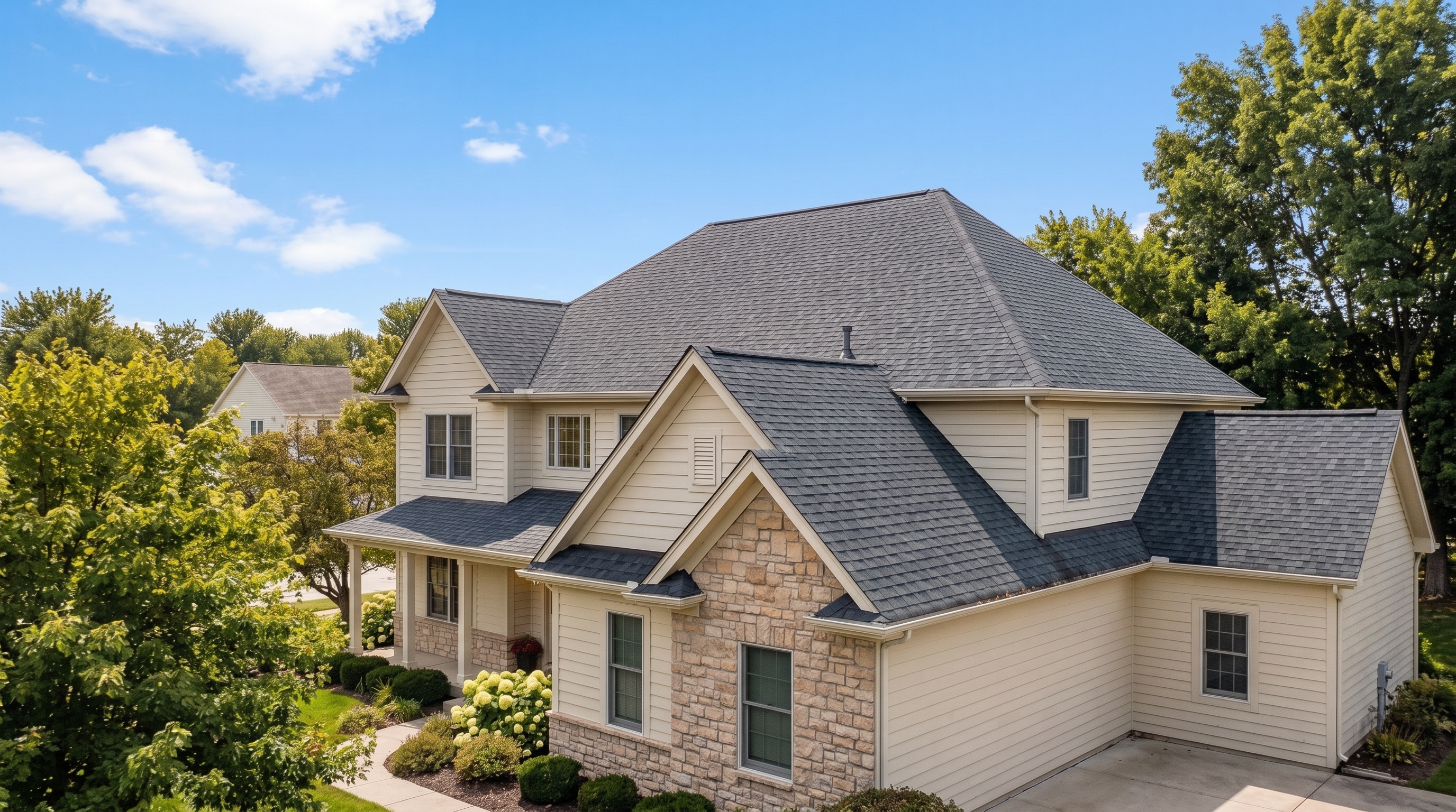 Finished dark shingle roof on a modern home